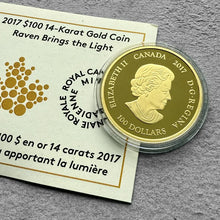 Load image into Gallery viewer, $100 2017 Raven brings the light Canada Gold coin
