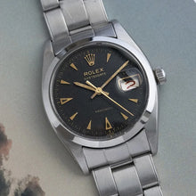 Load image into Gallery viewer, 1959 Rolex - Serviced Roulette Date Honey Comb Black Dial + Gold Markers / Hands
