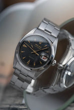 Load image into Gallery viewer, 1959 Rolex - Serviced Roulette Date Honey Comb Black Dial + Gold Markers / Hands
