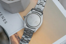 Load image into Gallery viewer, 1959 Rolex - Serviced Roulette Date Honey Comb Black Dial + Gold Markers / Hands
