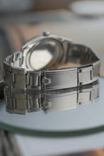 Load image into Gallery viewer, 1959 Rolex - Serviced Roulette Date Honey Comb Black Dial + Gold Markers / Hands

