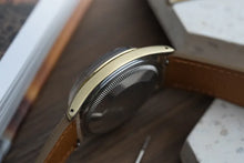 Load image into Gallery viewer, 1973 Rolex 1550 Date Grey Mosaic Dial- Gold Plated case with Riveted Bracelet
