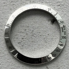 1980s Original Authentic Rolex 16520 Stainless Steel 200 Unites MK1 Bezel