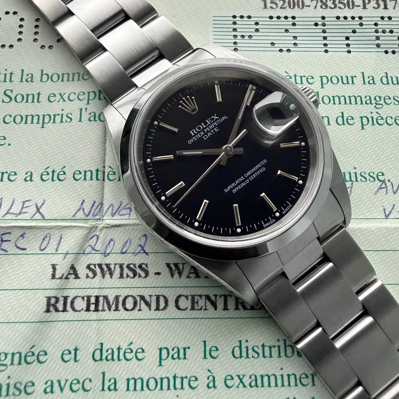 2002 Rolex Date 34mm 15200 Black Dial – Box and Papers