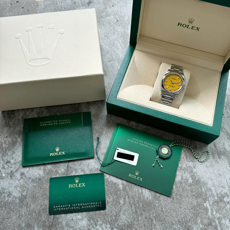 Discontinued - Rolex 36mm Oyster Perpetual 126000 Box/ Papers – Yellow Dial