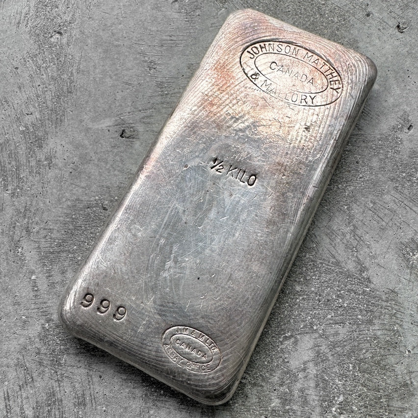 Vintage Johnson Matthey & Mallory 1/2 Kilo with nice pour lines