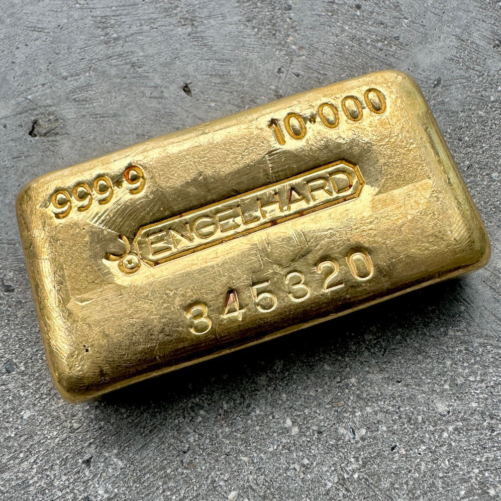 Available for sale is an Engelhard 10 oz Gold Poured Bar with a .9999 purity