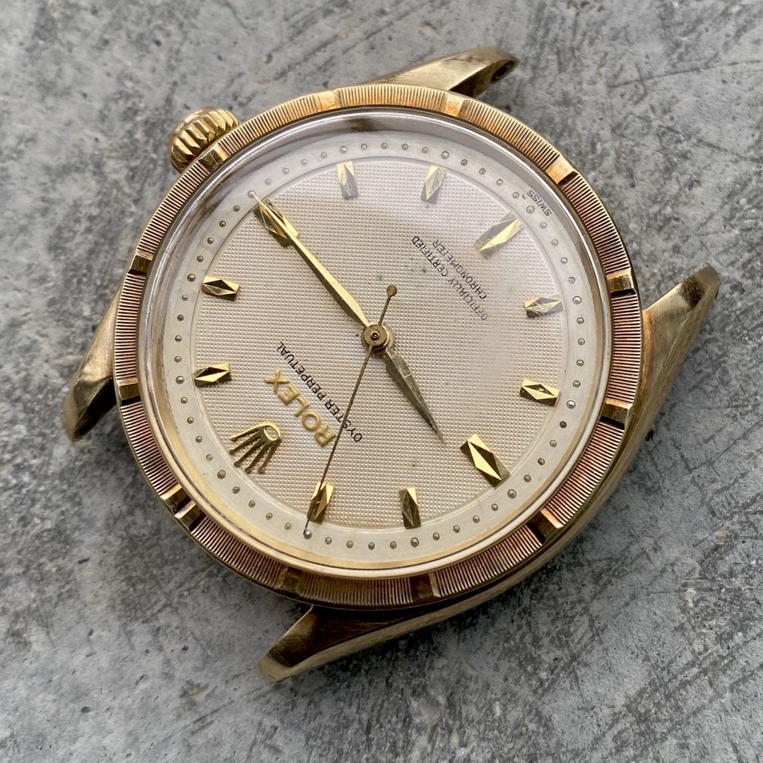 Rolex 6569 Yellow gold with stunning honey comb dial