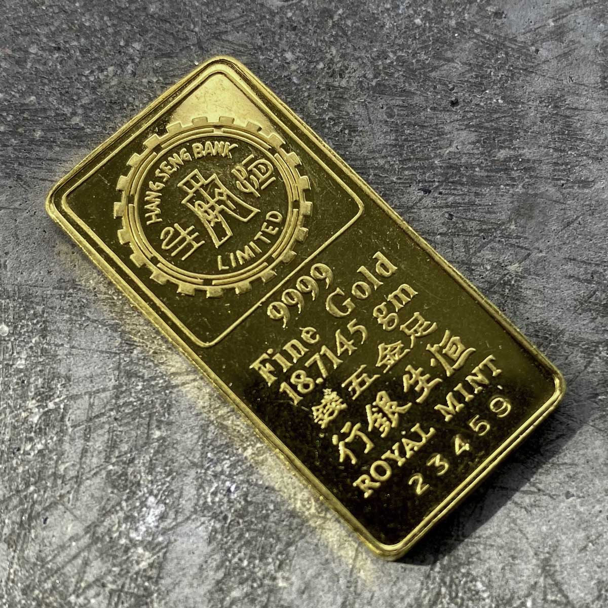 Interesting Hang Sang Bank 18.7145 .999 Gold Bar