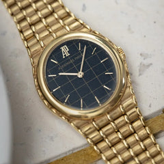 Ladies Audemars Piguet Bamboo 18K Yellow Gold Black Grid Pattern Dial