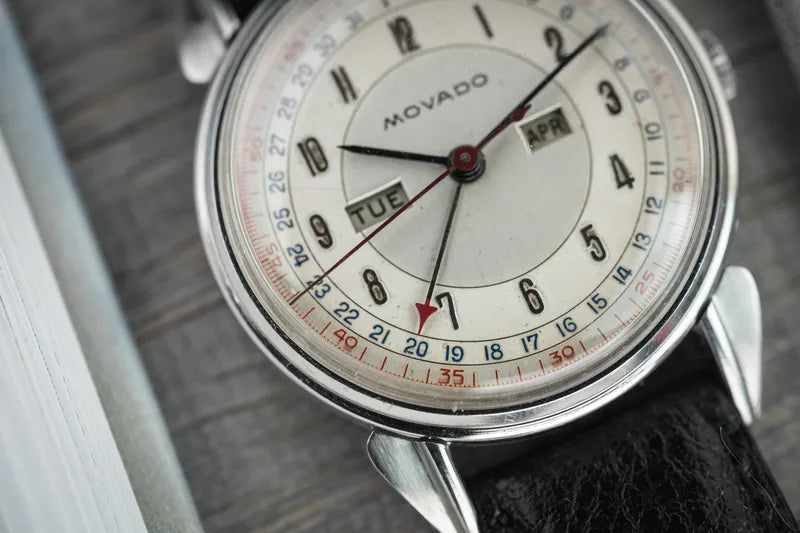 Movado Calendograf Triple Calendar 14823 Stainless Steel with Fancy Lugs