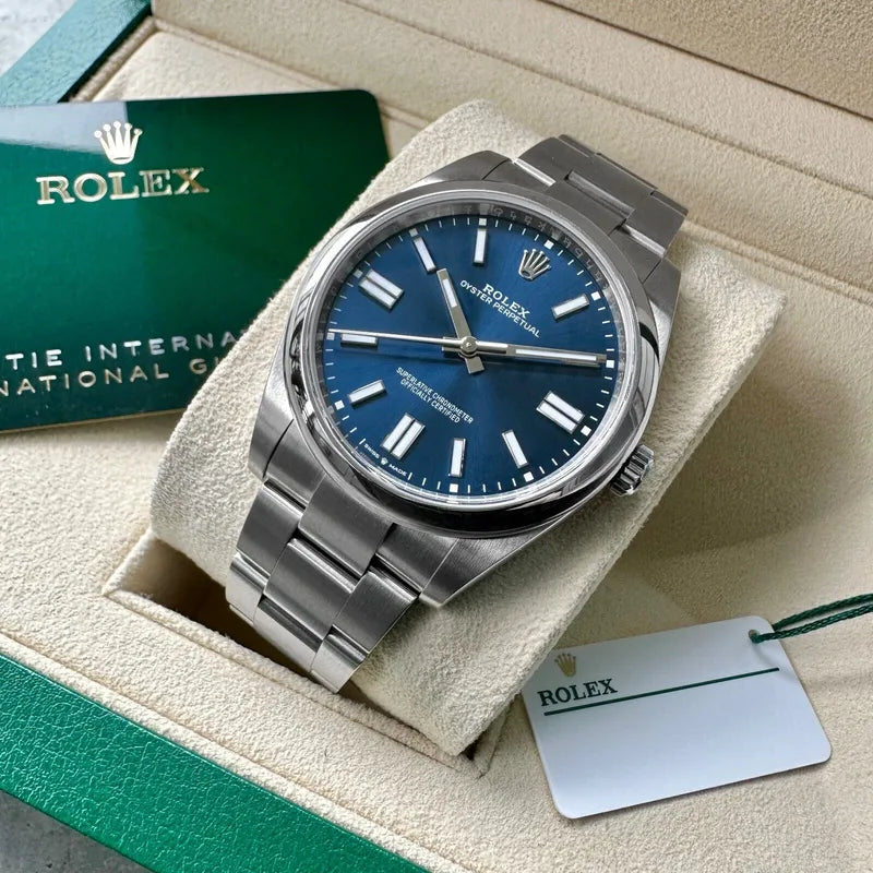 Unworn Rolex 41mm Oyster Perpetual 124300 Box/ Papers – Blue Dial -With Stickers