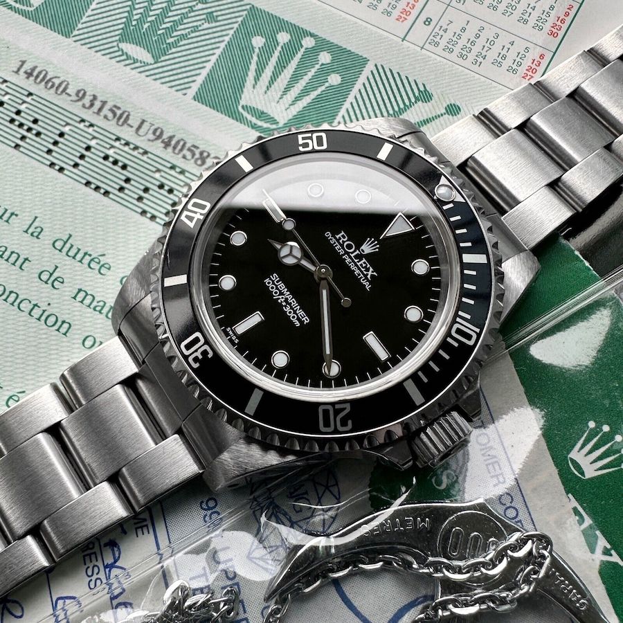 1999 Rolex 14060 Submariner Unpolished - Box / Papers - Swiss Only