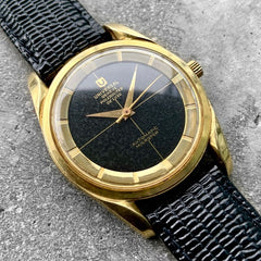 Universal Geneve De Luxe Polerouter Yellow Gold Micro Rotor 10357 - Black dial