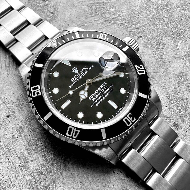 1999 Rolex 16610 Submariner – Box – Swiss Only Dial