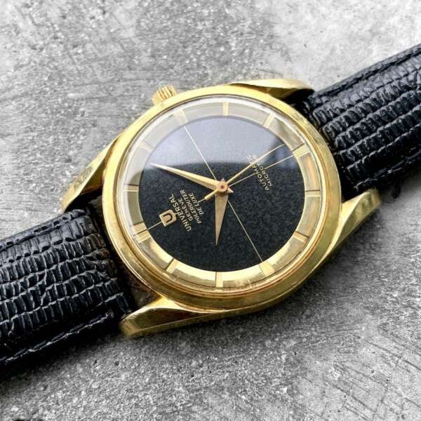 Universal Geneve De Luxe Polerouter Yellow Gold Micro Rotor 10357 - Black dial