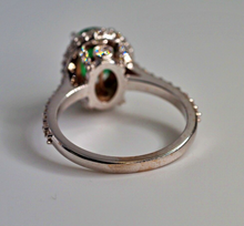 Load image into Gallery viewer, Vintage 1.75 Carat natural Emerald solid 14K white gold ring with Diamond halo
