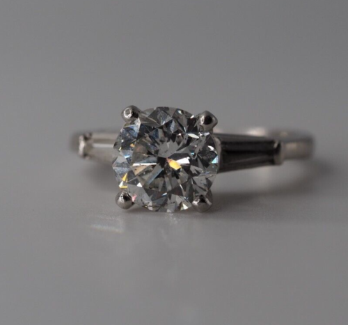 Vintage solid platinum 2.04 ct Diamond engagement ring with baguette shoulders
