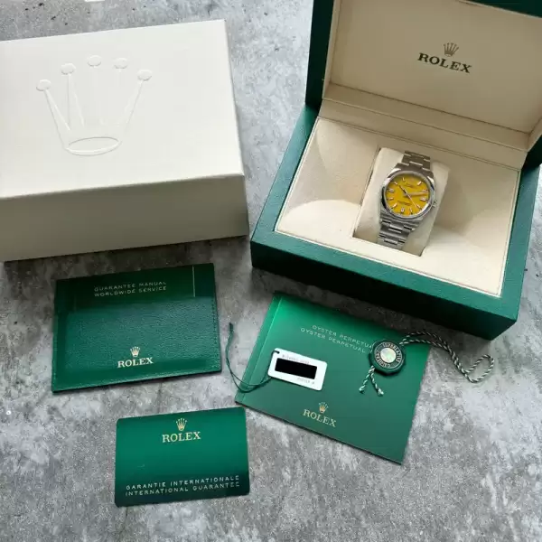 Discontinued Rolex 36mm Oyster Perpetual 126200 Box Papers–Yellow Dial10 result