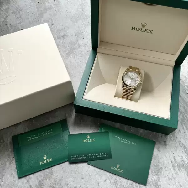 Rolex Yellow Gold President Roman Numeral Silver Dial 228238 Box Papers New Card61 result