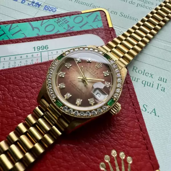 Unworn Ladies Rolex President Gold 69078 Diamond Dial Emerald Tropical Dial10 result